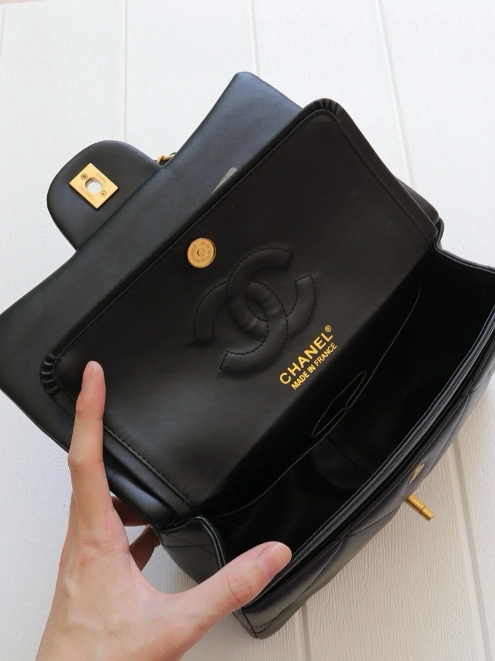 CHANEL Black Quilted Shoulder Bag with Gold Chain